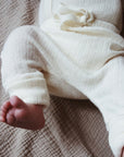 Babybroekje met voetjes - Pointelle - Merino wol