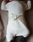 Babybroekje met voetjes - Pointelle - Merino wol